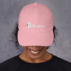 Bitcoin Baseball Caps (Dad Hats) in Pink on a someones head