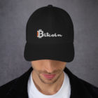 Bitcoin Baseball Caps (Dad Hats) in Black on a person