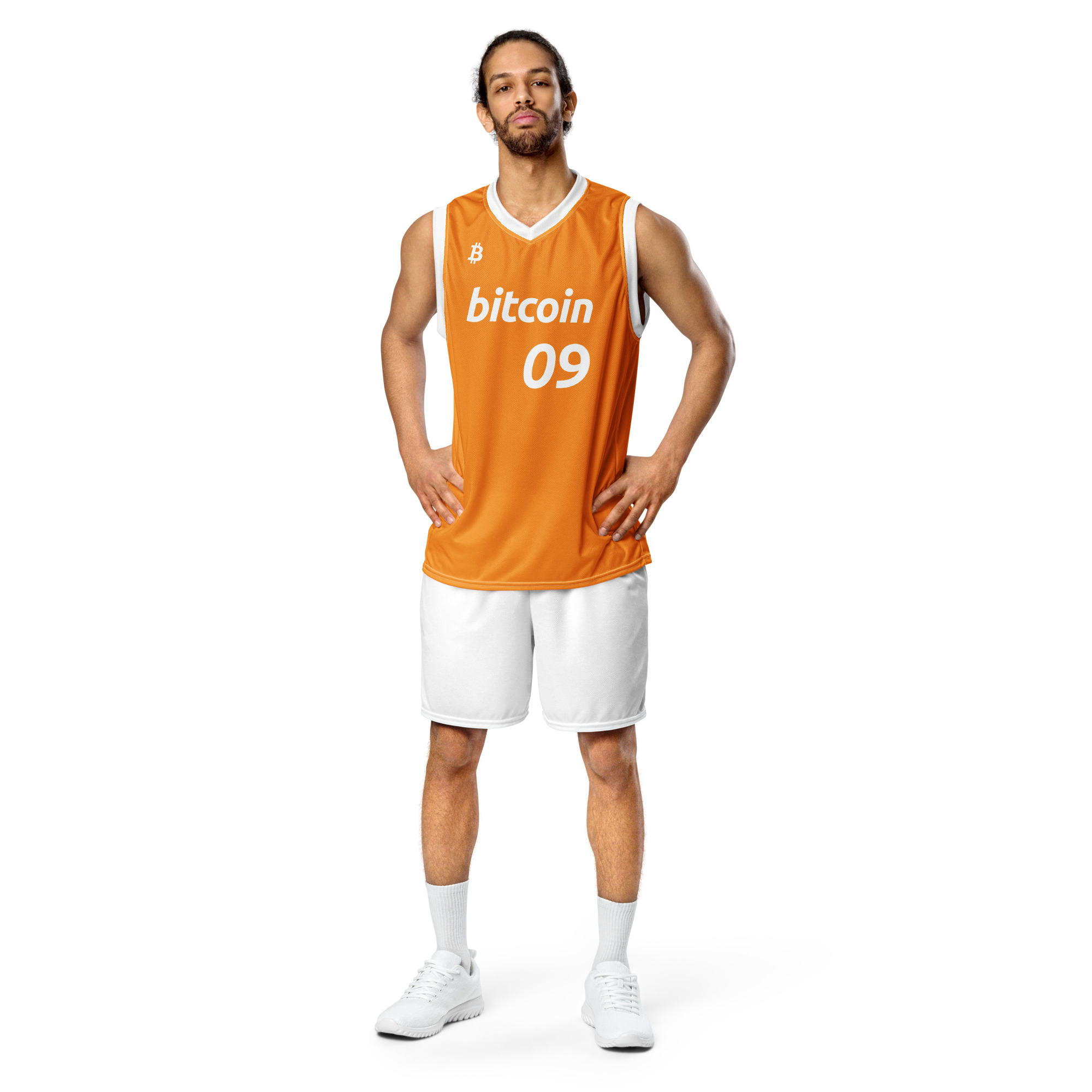 Front view of a Male wearing the Bitcoin Basketball Jersey with cargo pants. The Jersey features the Bitcoin icon in the top right chest, the Bitcoin logo and the number 09 to represent the year Bitcoin was created. On a white background. The lettering is in bitcoin font Ubuntu bold italic.