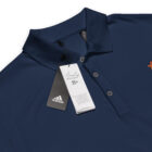 Bitcoin shirt - bitcoin adidas polo shirt lying flat close up of tags - Blue bitcoin polo shirt